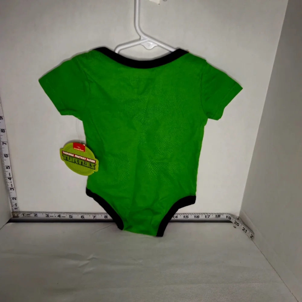 NICKELODEON TEENAGE‎ MUTANT NINJA TURTLE VARSITY TEAM TURTLES ONSIE 6-9 MONTHS